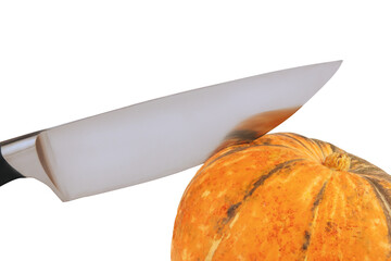 Knife in an orange pumpkin on a white background