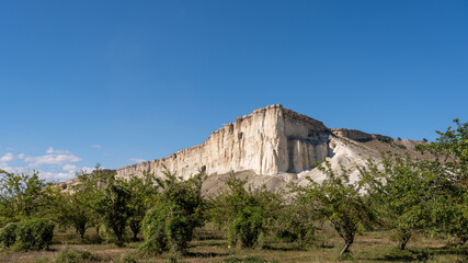 Fototapeta na wymiar natural white rock of the Crimean mountains with blue sky