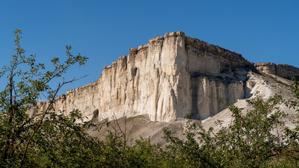 natural white rock of the Crimean mountains with blue sky