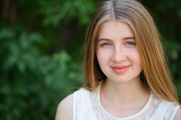 Naklejka premium portrait of beautiful cheerful girl