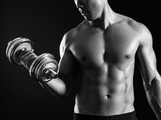 Asian man doing a bicep curl