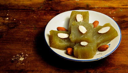 Wheat halwa garnished with badam