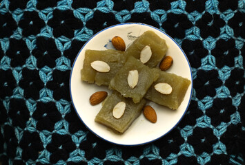 Wheat halwa garnished with badam