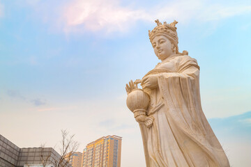 Mazu - Chinese sea goddess, the statue situated on the side of Tianhou Temple at Guwenhua Jie street in Tianjin, China