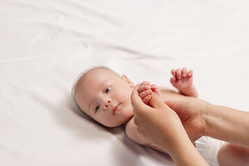 baby hand massage, close-up of hands and hand of baby