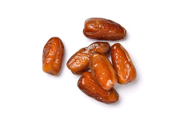 Top view of dried Date palm fruits isolate on white background.