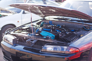 Sports motor intake elements close up on a sports car
