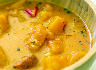 Chickpea and pumpkin stew surrounded by white background
