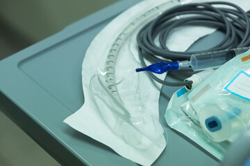 Syringe connected to endotracheal tube on the table