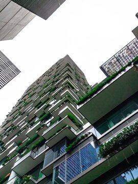 Apartment block in Sydney NSW Australia with hanging gardens and plants on exterior of the building 