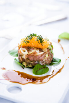 Jellied fish, garnished with roe and dill