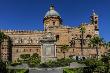 Fototapeta na wymiar Monument of Santa Rosalia (patron saint of Palermo city, 1744) in front of Palermo Cathedral Santa Vergine Maria Assunta. Palermo, Sicily, Italy.