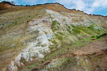 Nature background.  Soft focus of geological structure, landslide on steep coastal cliffs 