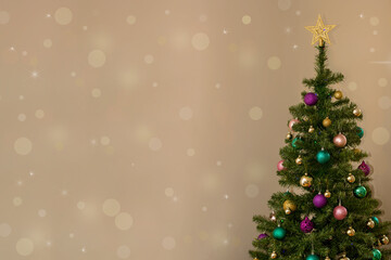 Christmas tree on neutral background with sparkles and copy space