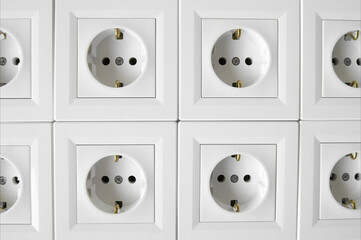Many of white European high voltage 220W sockets.