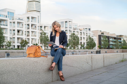 Woman using digital tablet