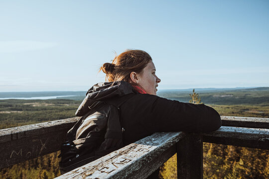 Female hiker looking at view