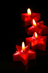 Indian festival diwali , candle on dark background