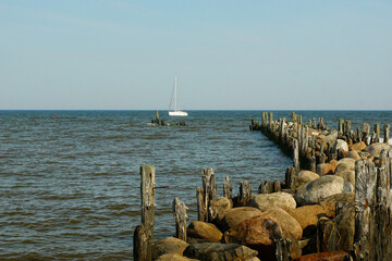 Travel photo of city Engure, Latvia. Baltic Sea with waves and mole