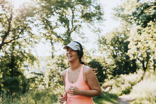 Happy woman jogging