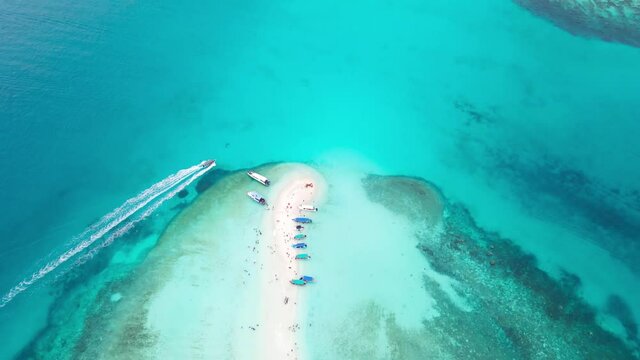 Aerial view footage of beautiful Sandbank island in clear turquoise blue ocean water at the Island of Redang, Terangganu Malaysia