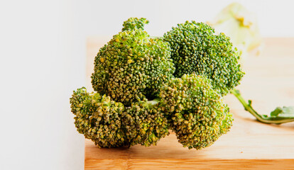 broccoli close up on wooden board