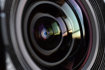 Close-up camera lens with color reflections