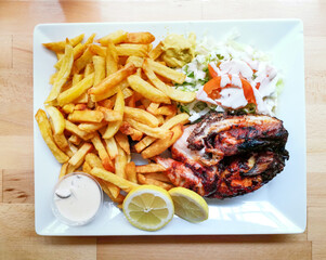 Caesar salad and Roasted Chicken of Italian Cheese tomatoes