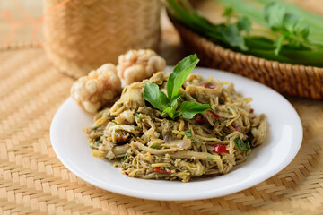Northern Thai food (Yum Nor Mai), Spicy bamboo shoot salad with crab paste eating with pork rind, ginger leaf and sticky rice, Local Thai food