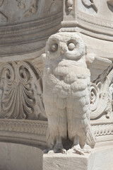 Owl on the pedestal of the column of National and Kapodistrian University of Athens, Greece