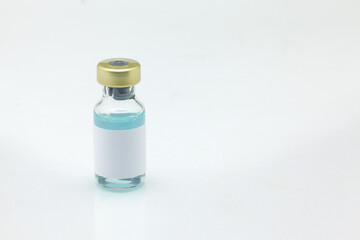 Isolated glass vaccine bottle with colored liquid very close high magnification mockup