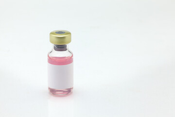 Isolated glass vaccine bottle with colored liquid very close high magnification mockup