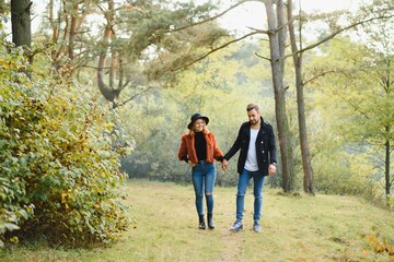 Fototapeta premium Romantic young couple in love relaxing outdoors in park