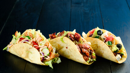 three mexican pork carnitas tacos flat lay composition