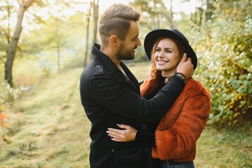 happy young couple in love outdoor in autumn