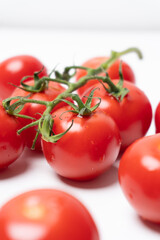 Close up small and tasty tomato shots