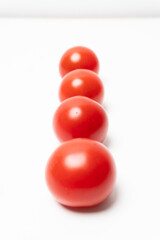 A line of small and tasty tomatoes