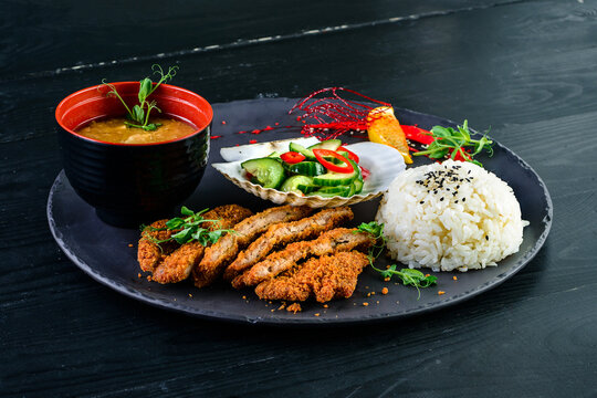 Japanese lunch set food. deep fried chicken or karake with teriyaki sauce