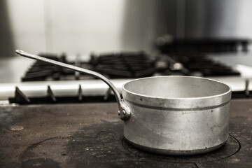 Chrome pot standing on hotplate