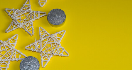 Christmas decorations on a yellow background. Copyspace. Flatlay