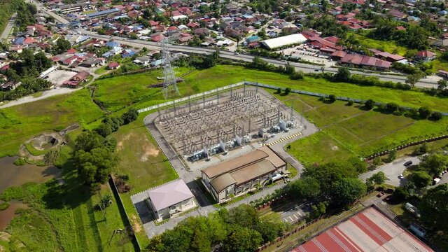 Aerial circuling view of Main Distribution Sub-station nearby residential area