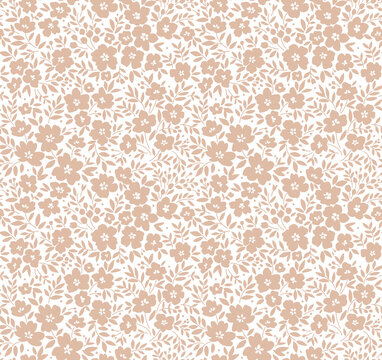Cute floral pattern in the small flower. Seamless vector texture. Elegant template for fashion prints. Printing with small begie flowers. White background.