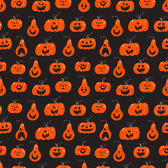 Halloween seamless pattern with pumpkins with scary face