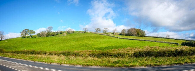 Fototapeta na wymiar Panorama View across open farmland near Ings in the Lake Distict UK