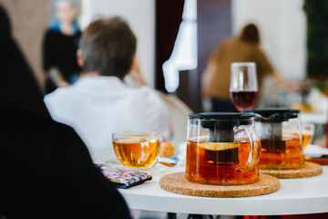 a cup of tea and a teapot