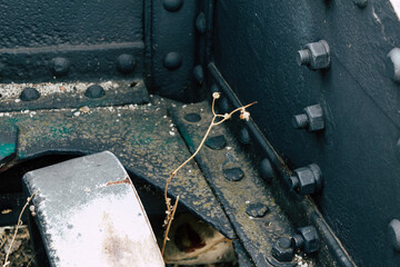 machinery parts with nuts and bolts of a train in a park in the center of Madrid
