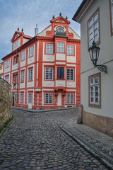 Crossroads and a beautiful autumn view of historic buildings near Prague Castle, Czech Republic