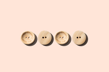 Wooden buttons isolated. Wooden buttons pattern. Handmade wooden button set top view, flat lay. Button front and reverse sides.