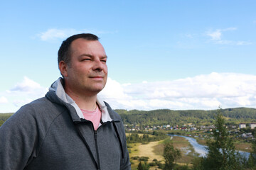 Man Posing On Mount Paaso in Karelia