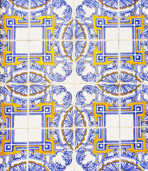 Detail of the traditional tiles from facade of old house. Decorative tiles.Portuguese traditional tiles. Floral ornament.